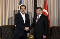 Σμύρνη: Η εφαρμογή των συμφωνιών για τις προσφυγικές ροές στη συνάντηση Νταβούτογλου - Τσίπρα