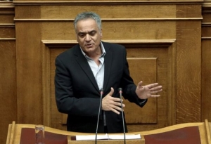 Ο Σκουρλέτης μειώνει την χρηματοδότηση των κομμάτων μέσω κουπονιών