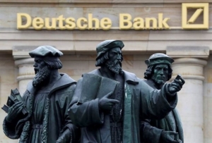 «Θυροκολλήθηκαν» στην Deutsche Bank οι 95 θέσεις κατά του χρηματοπιστωτικού καπιταλισμού