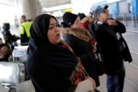 Χάος, σύγχυση και μηνύσεις μετά το μπλόκο Τραμπ