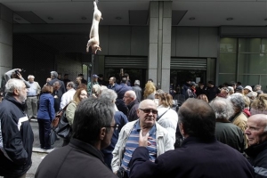 Το Δικαστήριο της ΕΕ δικαιώνει τους χειρισμούς Παπαδήμου για PSI