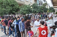 Διανομή υλικού σε μετανάστες και πρόσφυγες σε Ελαιώνα-Γαλάτσι