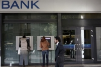 Νάρκη για χρέος και τράπεζες