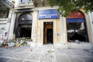 Οκτώ χρόνια από τον εμπρησμό της Marfin και τη δολοφονία τριών υπαλλήλων